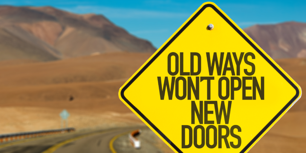 Road sign that says 'Old ways won't open new doors'.